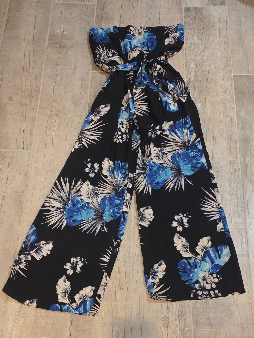 Premier Amour Black Strapless Wide-Leg Jumpsuit with Blue Floral